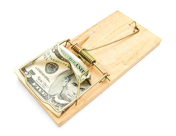 istock Money in a mousetrap. 179244763