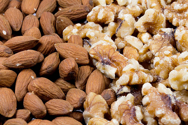 istock Close up of shelled walnuts  and almonds 179245126