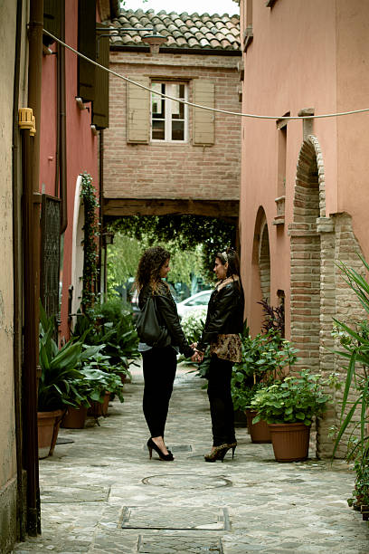 istock Young lesbian couple in a village 179245353