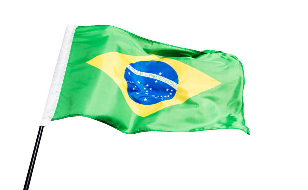 istock Brazilian flag waving against white background 1792458696