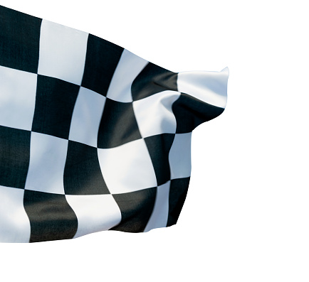 Closeup of checkered flag against white background
