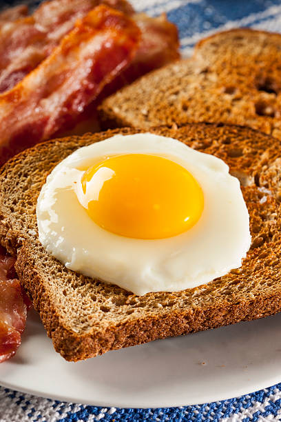 istock Organic Sunnyside up Egg with toast and bacon 179246110