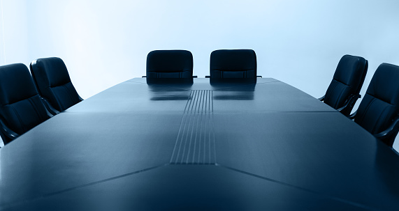 3d rendering of Meeting table with chairs on plank wooden floor background, meeting room. Minimal Concept.