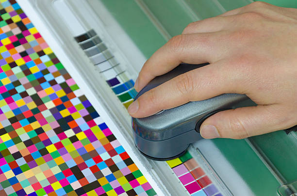 istock icc profiling, spectrophotometer robot measures color patches on Test Arch 179246610
