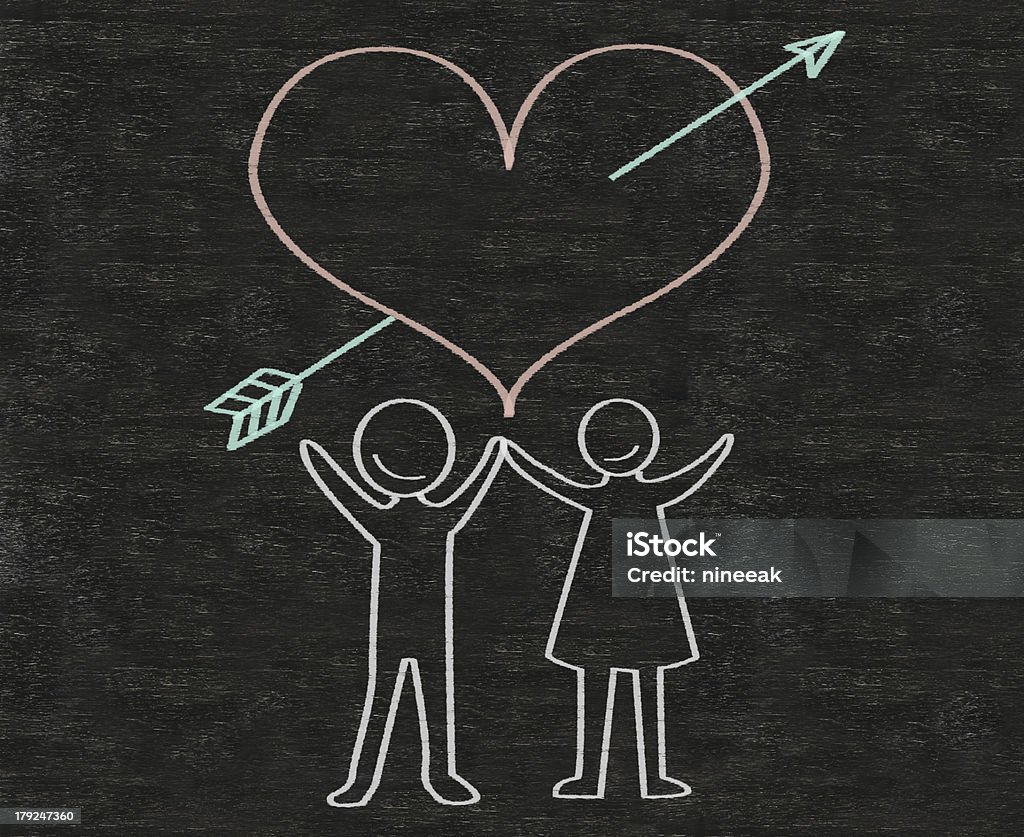 Hombre y mujer con amor escrito en fondo de pizarra - Foto de stock de Adulto libre de derechos
