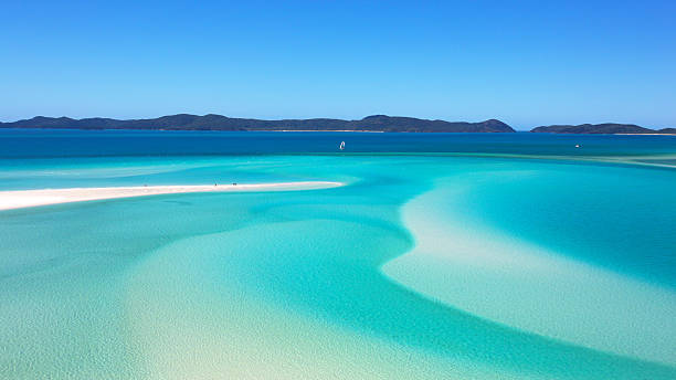 Whitsundays Whitehaven Beach Destination scenic of Whitehaven Beach in the beautiful Whitsundays, North Queensland Australia. inlet photos stock pictures, royalty-free photos & images