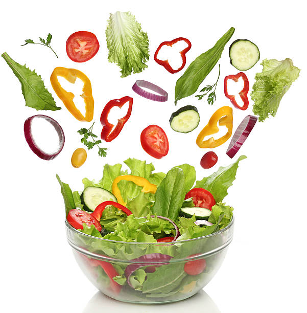 istock Falling fresh vegetables. Healthy salad isolated 179247832