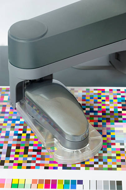 istock icc profiling, spectrophotometer robot measures color patches on Test Arch 179248262