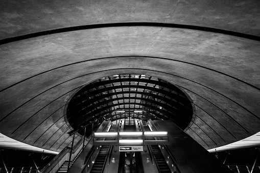 A low angle of London Subway in grayscale