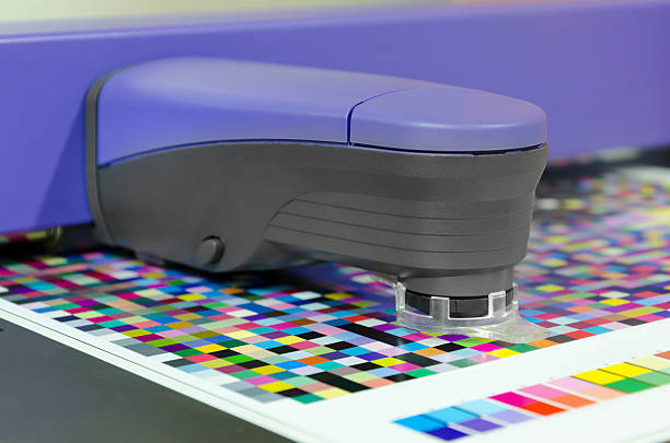 istock icc profiling, spectrophotometer robot measures color patches on Test Arch 179248368