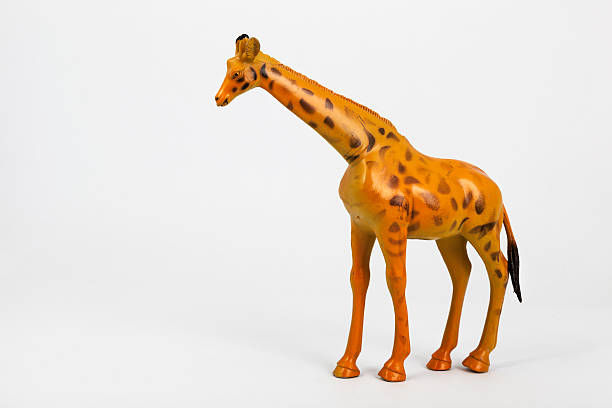 istock plastic toy animals giraffe and elephant 179248691