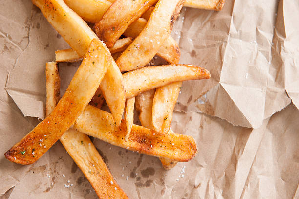 istock French Fries on a brown paper bag 179248721