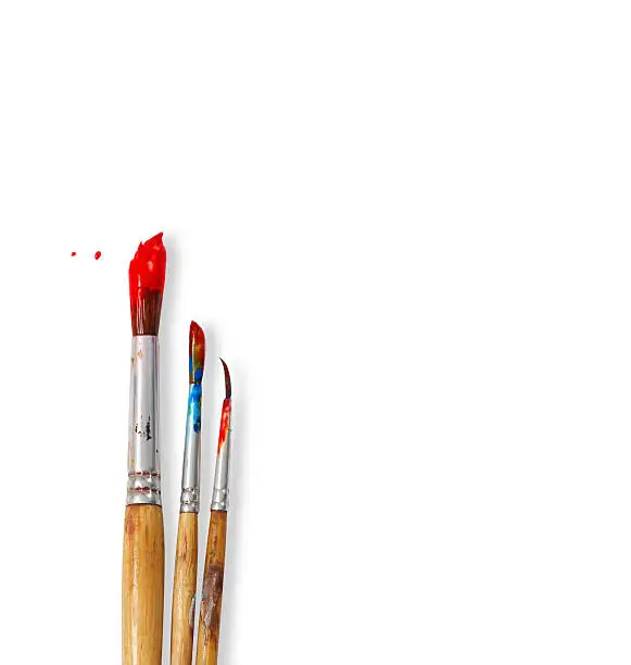 Photo of paint brushes isolated on white background