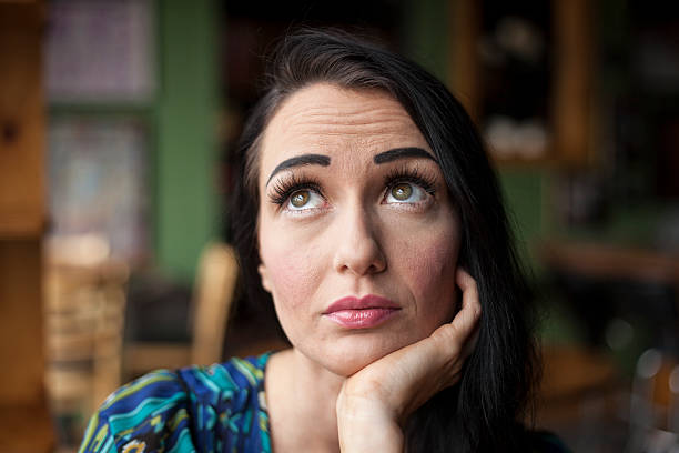 istock Beautiful Young Woman with Pensive Expression 179248913