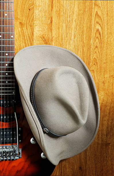istock Cowboy hat and guitar 179249060