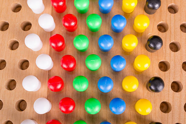 istock chinese checkers wooden board game 179249188