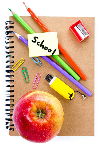 istock Back to school supplies with Notebook, red apple 179249393