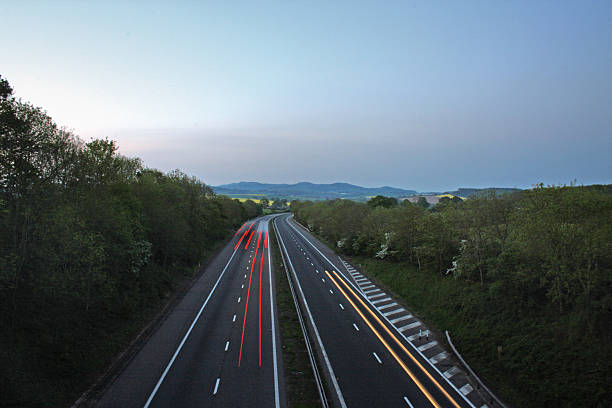 istock Dual carriageway at Dusk with moving traffic 179249402