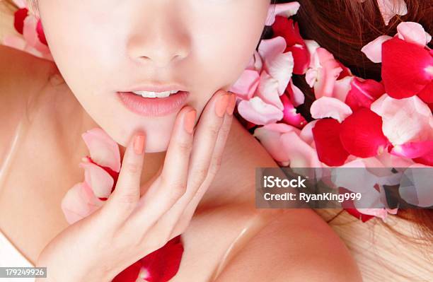 Woman Beautiful Lips With Pink And Red Roses Stock Photo - Download Image Now - Facial Mask - Beauty Product, Photography, Valentine's Day - Holiday