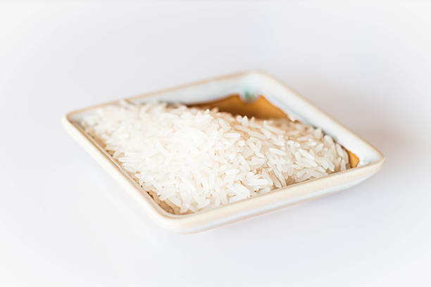 istock White rice cereal food on clean table 179250191