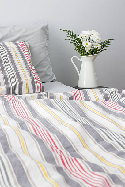 istock Fresh white flowers decorating a bedroom 179250286