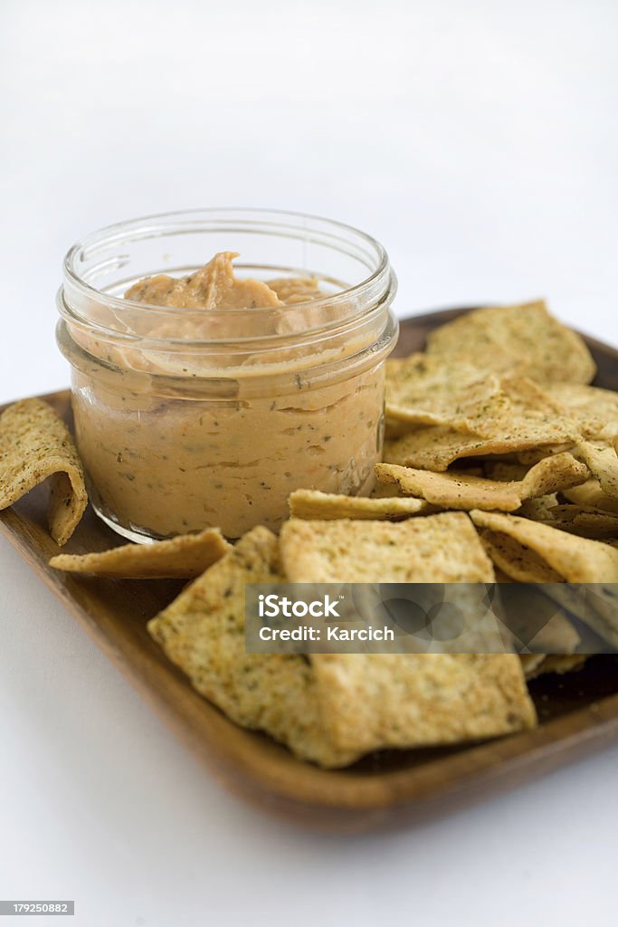 Hummus and Chips Hummus Tomato Basil with Crisp Pita Chips Appetizer Stock Photo