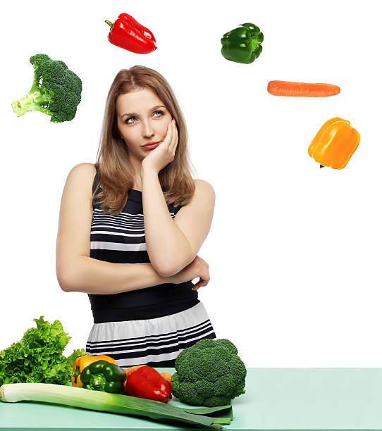 istock Beautiful young woman with vegetables 179251933