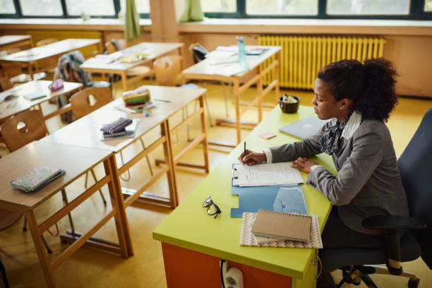 Young female teacher in the classroom