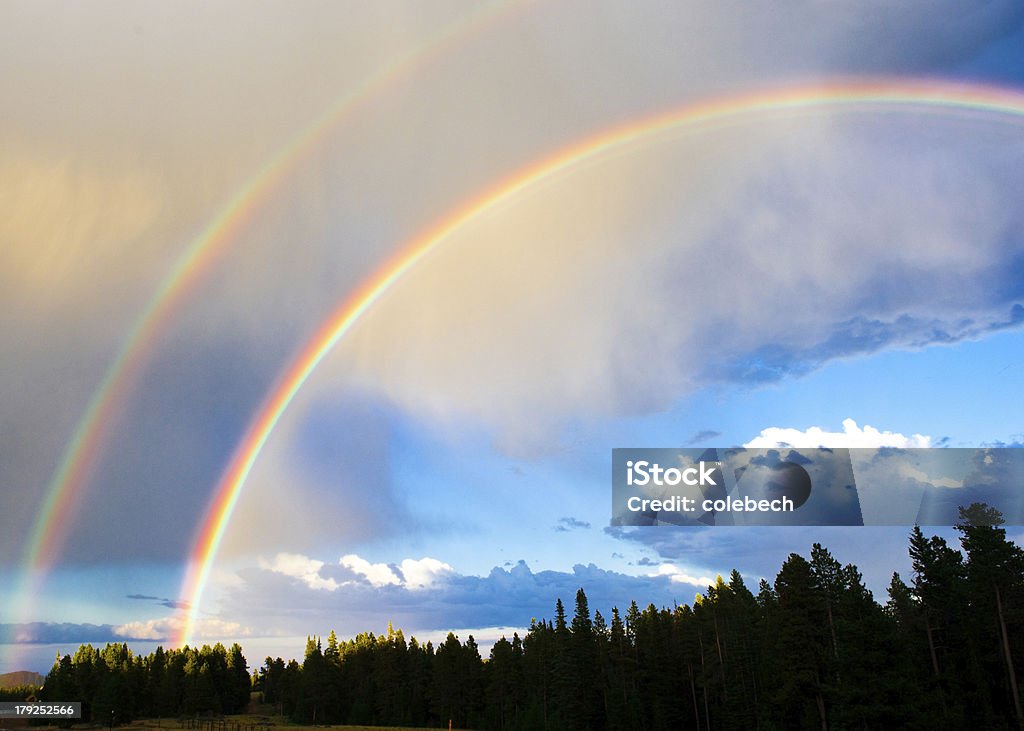 Double Rainbow double rainbow in the mountains Double Rainbow Stock Photo