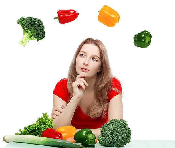 istock Beautiful young woman with vegetables 179254366