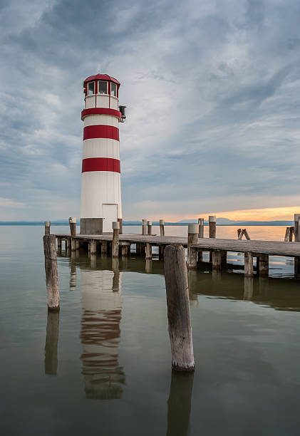 istock Lighthouse at Lake Neusiedl during sunset 179254420
