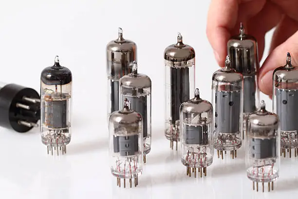 Glass vacuum radio tubes.  Isolated image on white background