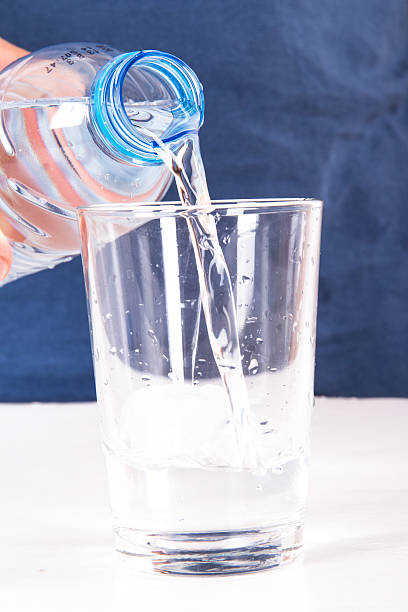istock Water Bottle and Glass 179257210