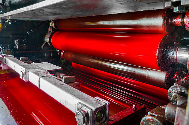 istock red, magenda ink color drum of web set print machine 179257292
