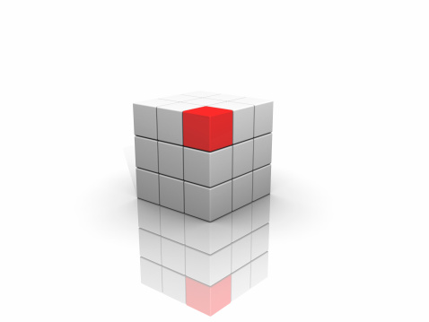 One different red cube on the white backround.
