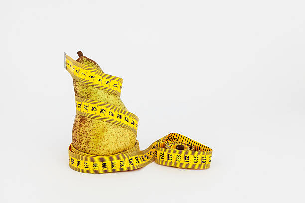 istock Pear and measurement tape 179258331