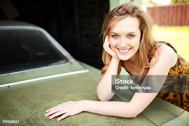 Beautiful Girl Leaning Over Dirty Old Car Stock Photo - Download Image Now - 20-24 Years, Adult, Adults Only