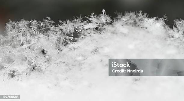 Snowflake In White Snow Stock Photo - Download Image Now - Abstract, Black Color, Celebration