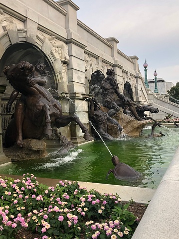 Court of Neptune Fountain with Flowers in the Summer