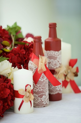 Candles as decoration on wedding or festive table.