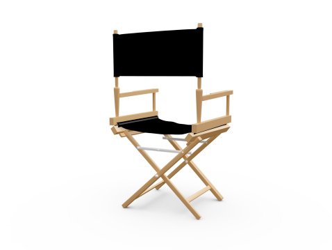 Back view of directors chair in film industry, isolated on white background.