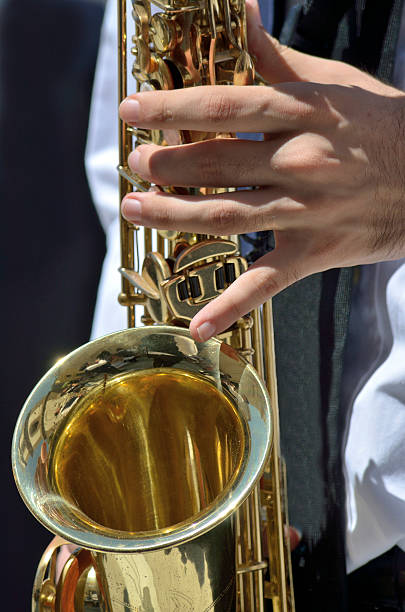istock Saxophonists fingers 179259438