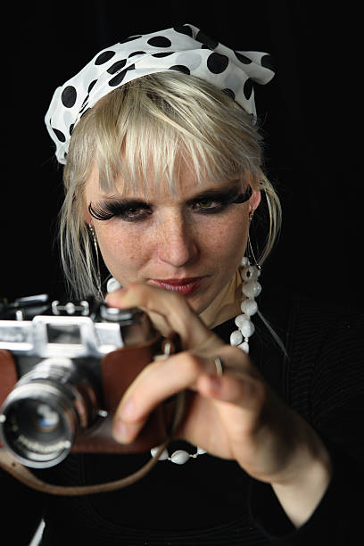 istock Retro woman with camera 179259788