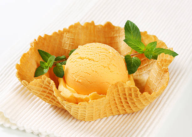 istock Orange sherbet in a waffle basket 179260115