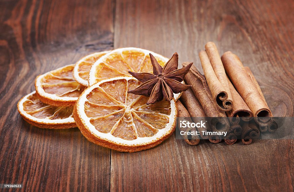 Sliced of dried orange, anis and cinnamon Sliced of dried orange, anis and cinnamon. Christmas decoration Anise Stock Photo