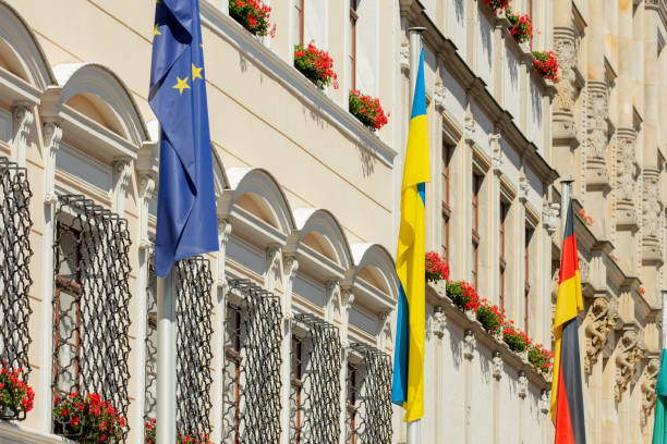 EU, Germany and Ukraine flags on house stock photo