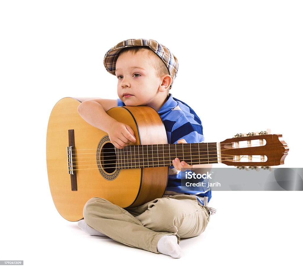Boy and guitar Boy wondering what's to next song, white background Acoustic Music Stock Photo