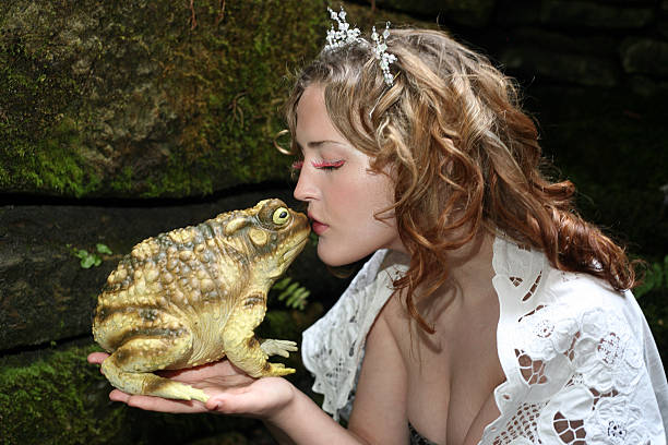istock princess kissing frog 179261542