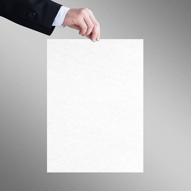istock White sheet in the men hand 179262214
