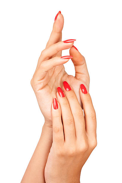 ręce do manicure - red nail polish zdjęcia i obrazy z banku zdjęć